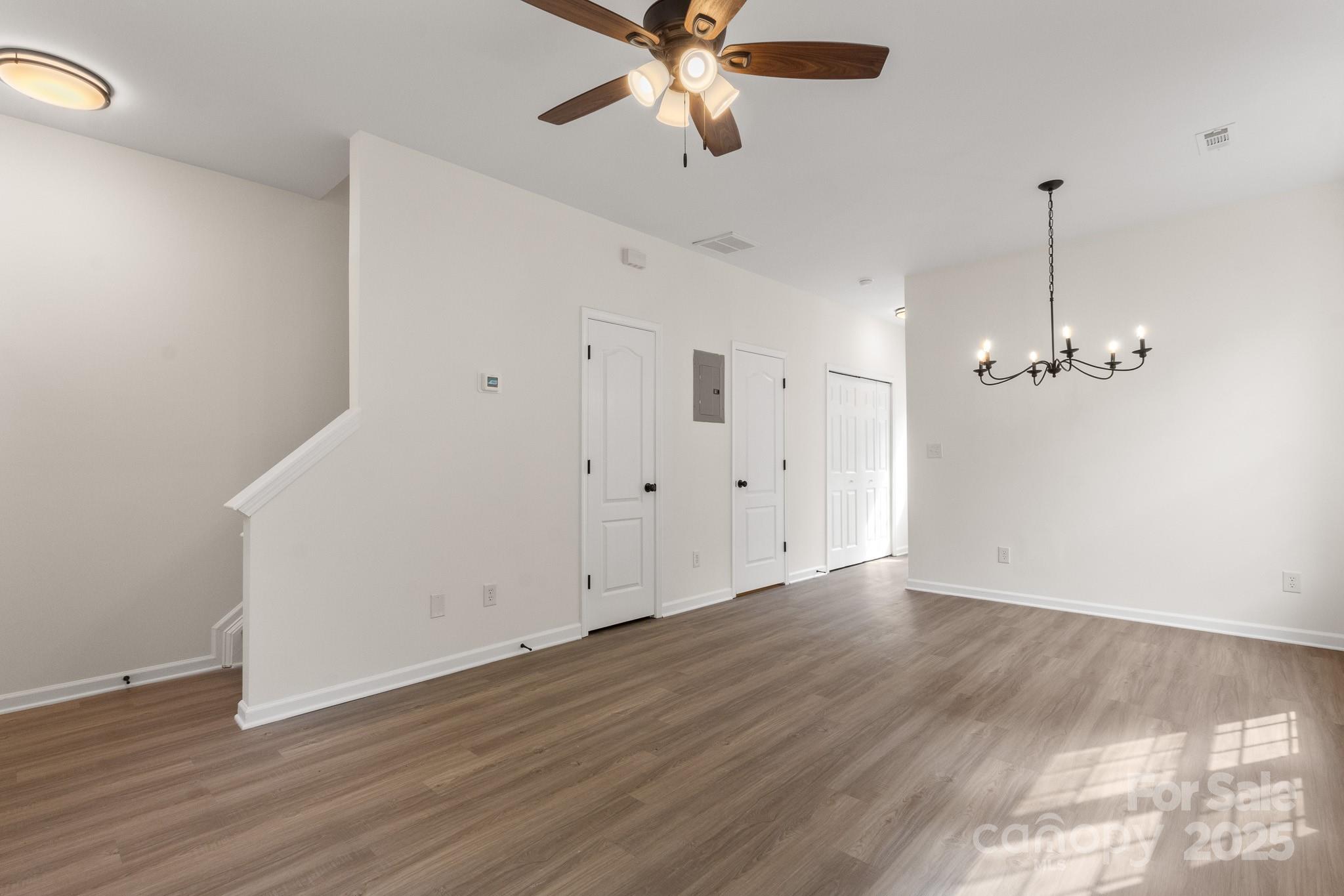 5529 Seths Drive Charlotte, NC 28269 - Photo 3 of 32 a view of empty room with wooden floor