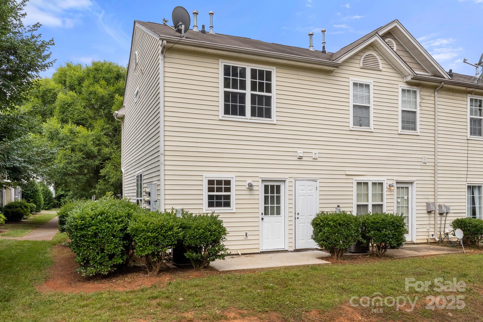 5529 Seths Drive Charlotte, NC 28269 - Photo 31 of 32 a front view of a house with a yard