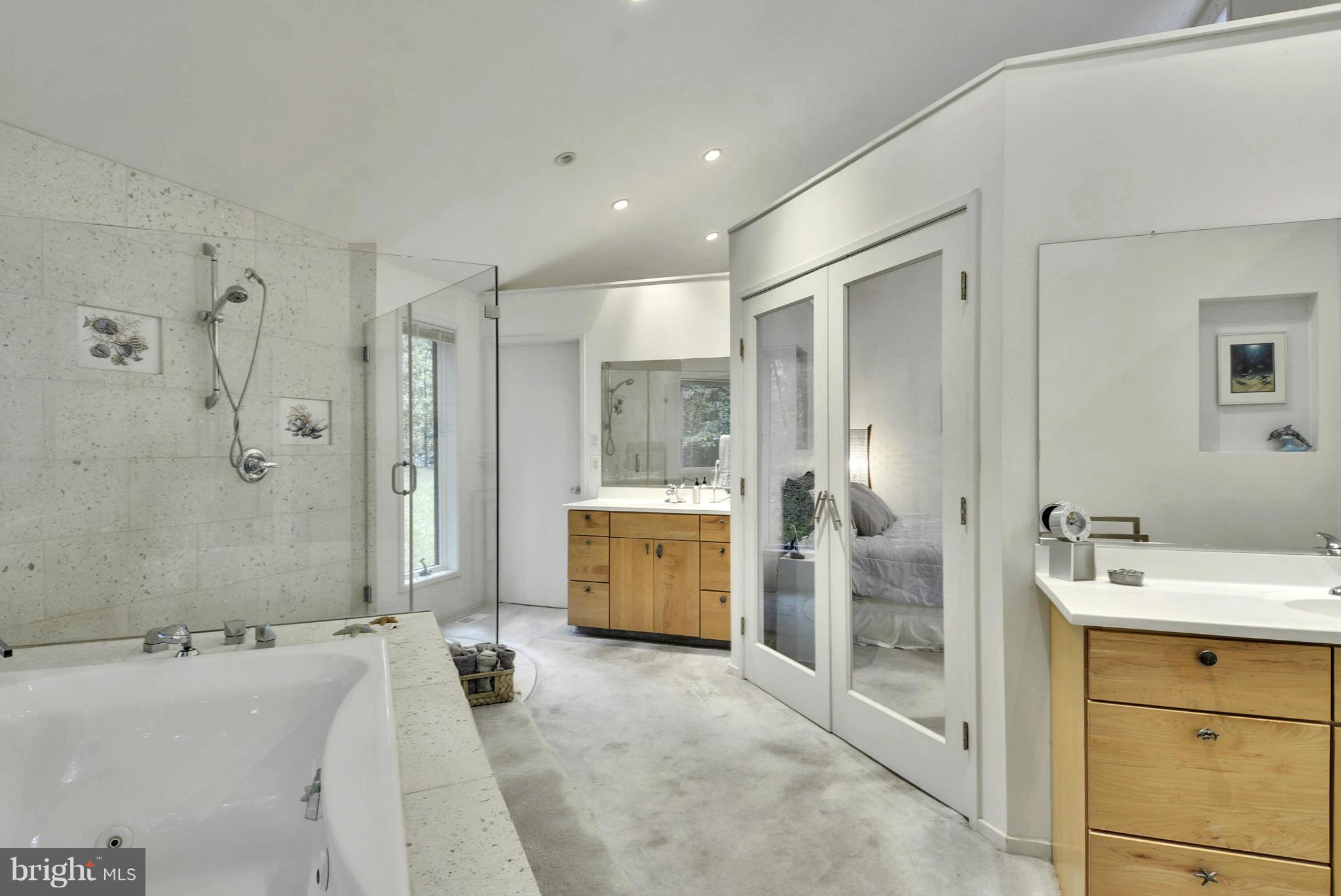 2600 Tack Lane Reston, VA 20191 - Photo 12 of 30 a bathroom with a tub sink and mirror