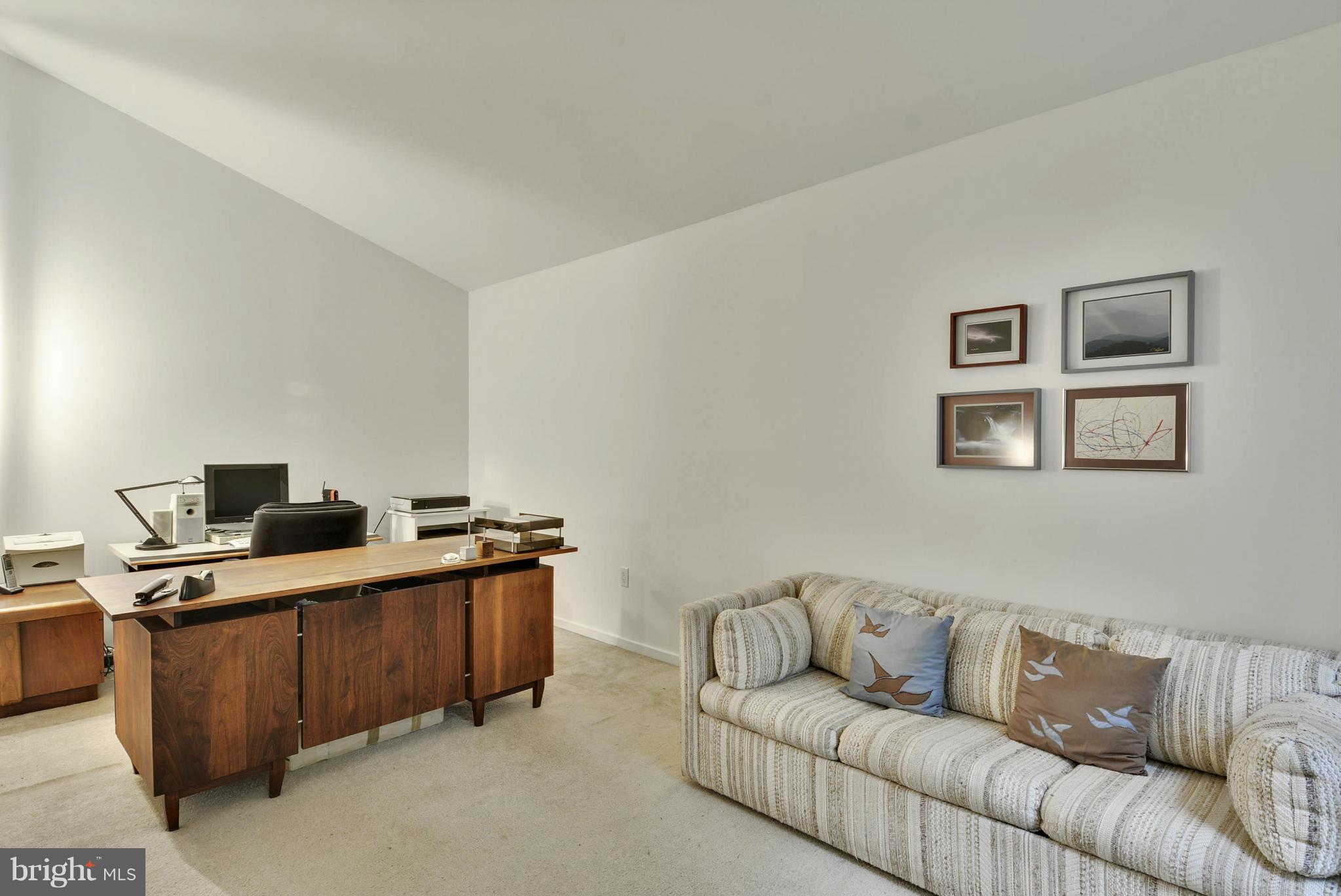 2600 Tack Lane Reston, VA 20191 - Photo 15 of 30 a view of a livingroom with workspace and a couch