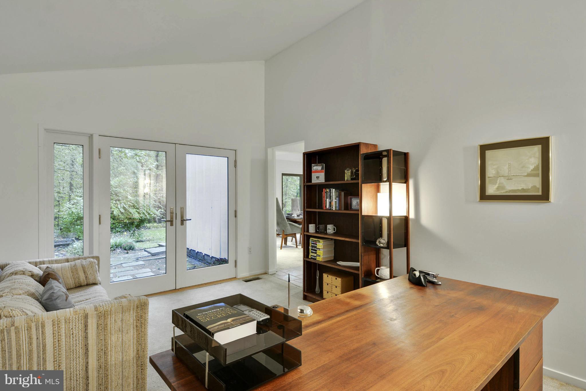 2600 Tack Lane Reston, VA 20191 - Photo 16 of 30 a living room with furniture and a flat screen tv