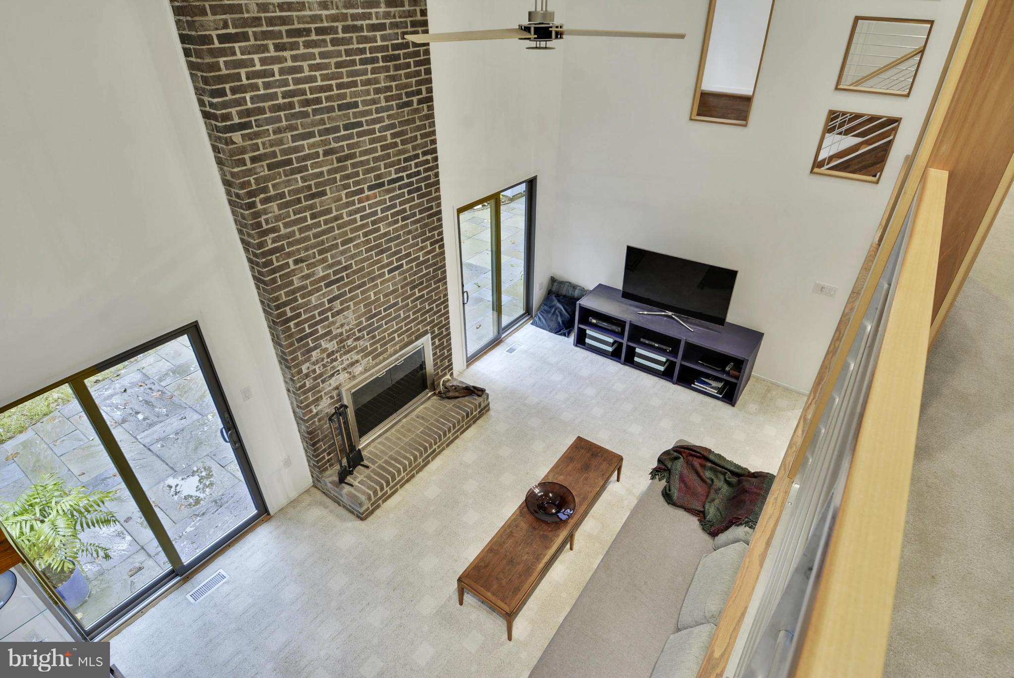 2600 Tack Lane Reston, VA 20191 - Photo 22 of 30 a living room with furniture and a flat screen tv