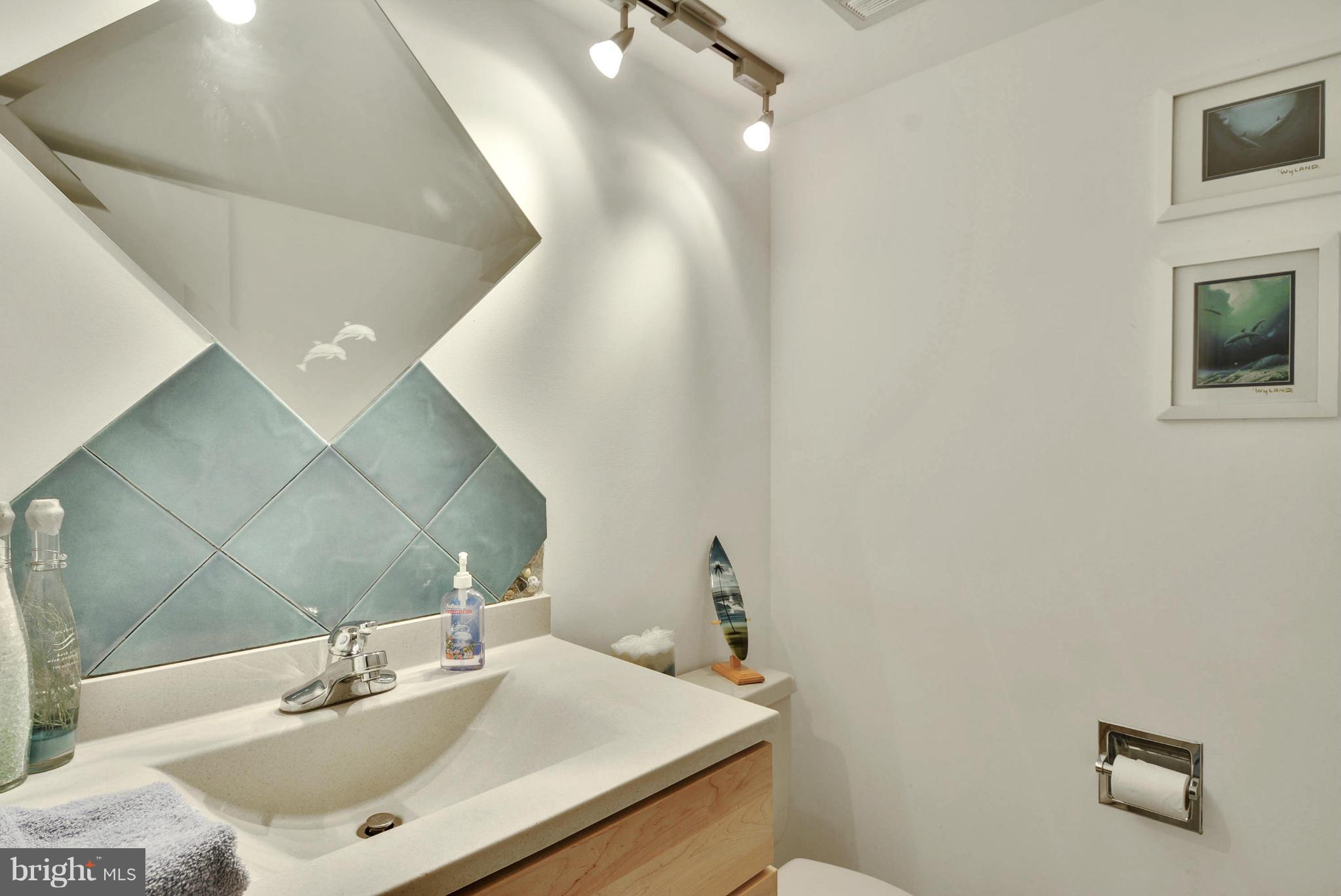 2600 Tack Lane Reston, VA 20191 - Photo 5 of 30 a bathroom with a sink and a mirror
