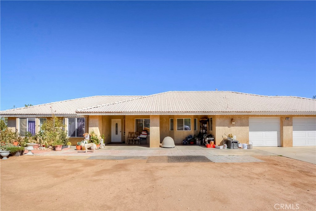9331 Manada Road Phelan, CA 92371 - Photo 2 of 38 a view of a house with a patio