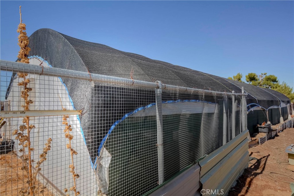 9331 Manada Road Phelan, CA 92371 - Photo 28 of 38 a view of outdoor space and front view of a house