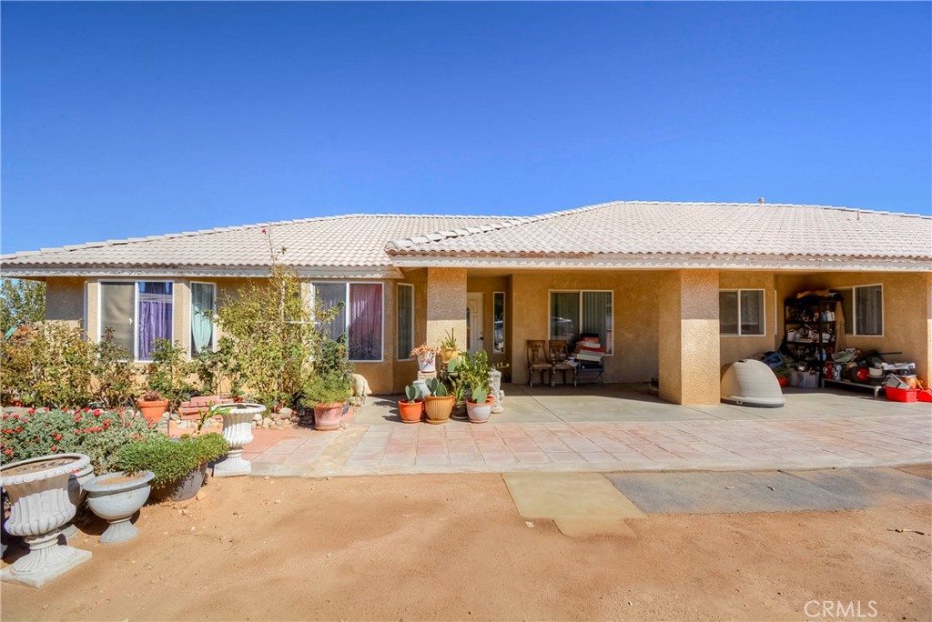 9331 Manada Road Phelan, CA 92371 - Photo 3 of 38 a view of a house with sitting area and furniture