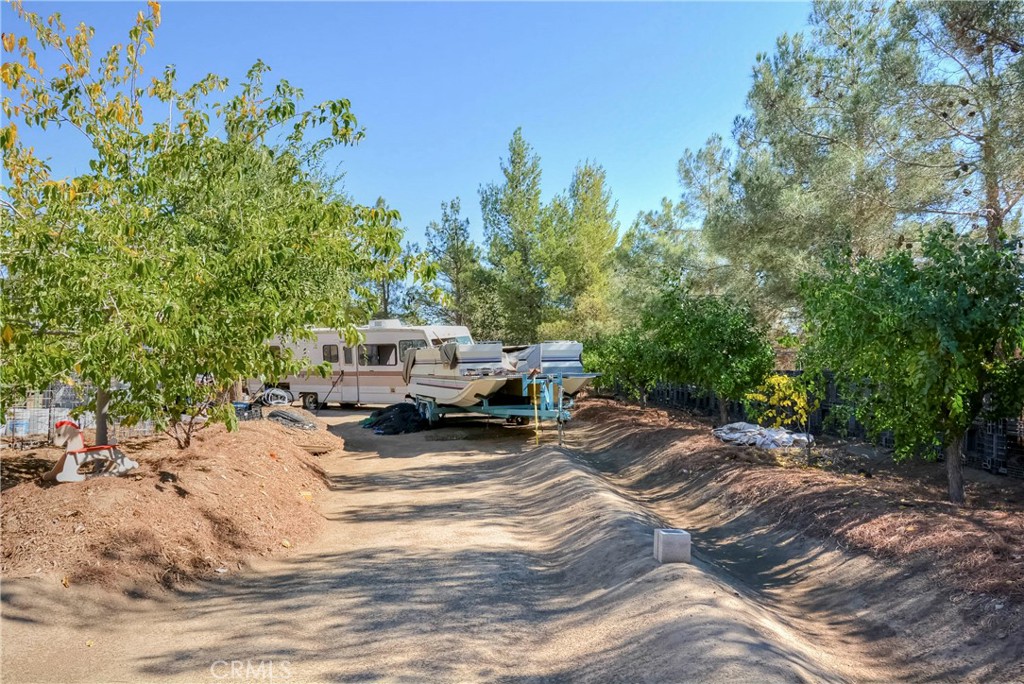 9331 Manada Road Phelan, CA 92371 - Photo 7 of 38 a view of a backyard with sitting area