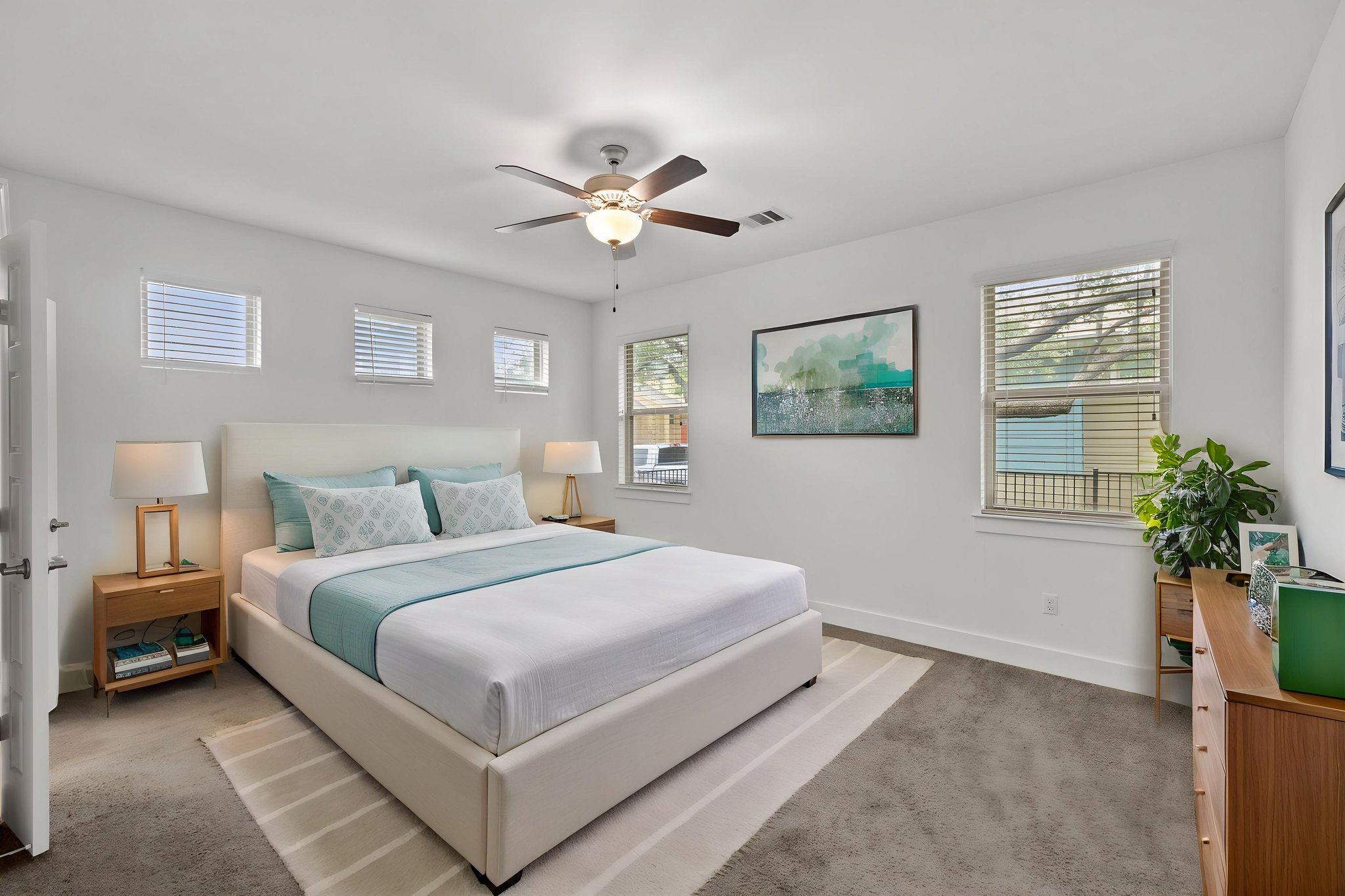 1765 Rowdy Loop, Unit 47 Leander, TX 78641 - Photo 26 of 39 Spacious room featuring carpeted flooring and multiple windows with blinds