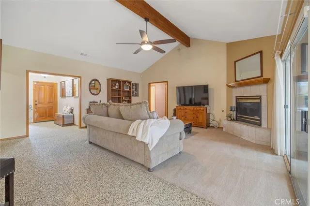 a large kitchen with stainless steel appliances granite countertop a sink and cabinets