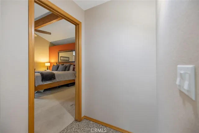 a view of a chairs and table in backyard of the house