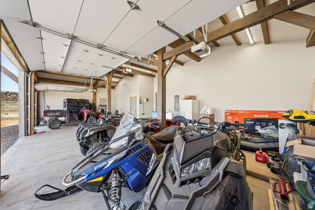 46997 West Thunder Road Fruitland, UT 84027 - Photo 48 of 49 Garage with electric panel and a garage door opener