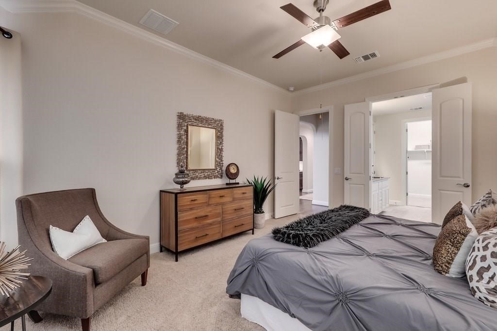 10825 Ballard Path Austin, TX 78717 - Photo 21 of 39 a bedroom with a bed and furniture
