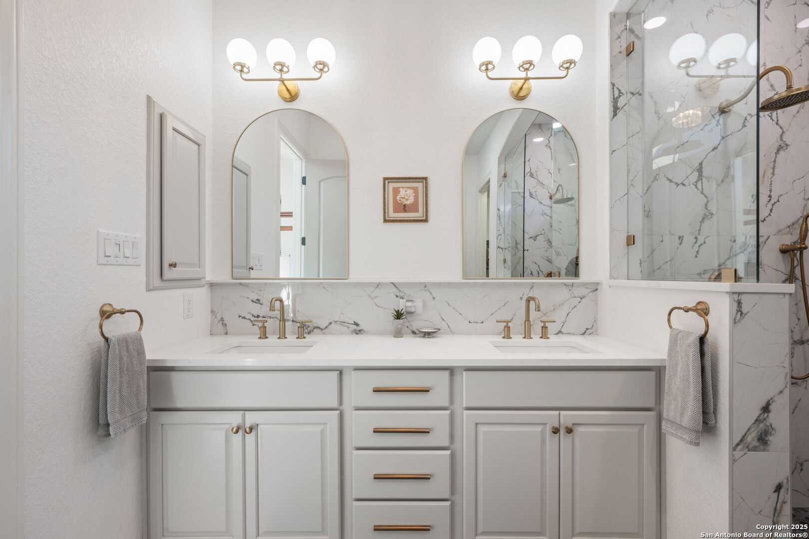 28827 Pfeiffers Gate Fair Oaks Ranch, TX 78015 - Photo 5 of 36 a bathroom with double vanity sinks and a mirror