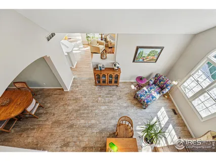a kitchen with stainless steel appliances white cabinets and a refrigerator