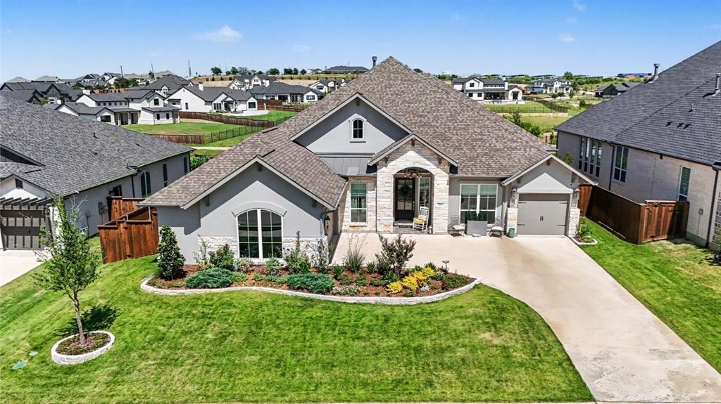 573 Broadleaf Way Haslet, TX 76052 - Photo 33 of 35 a front view of a house with garden