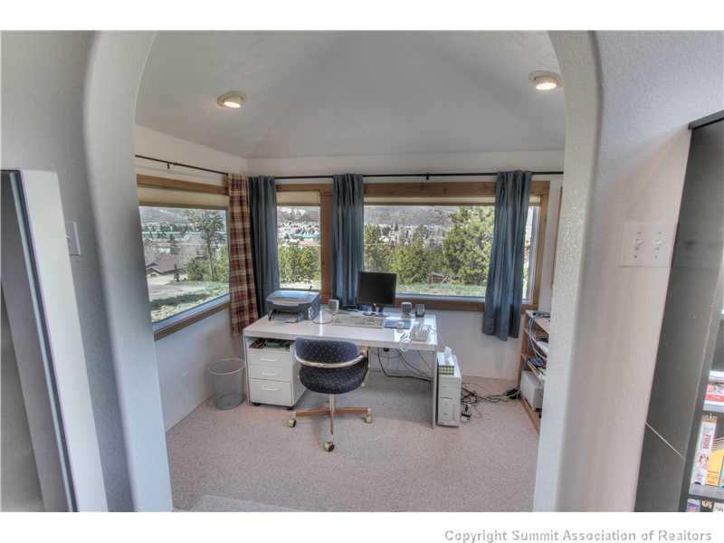 48 H Road Silverthorne, CO 80498 - Photo 9 of 18 a living room with furniture and a large window