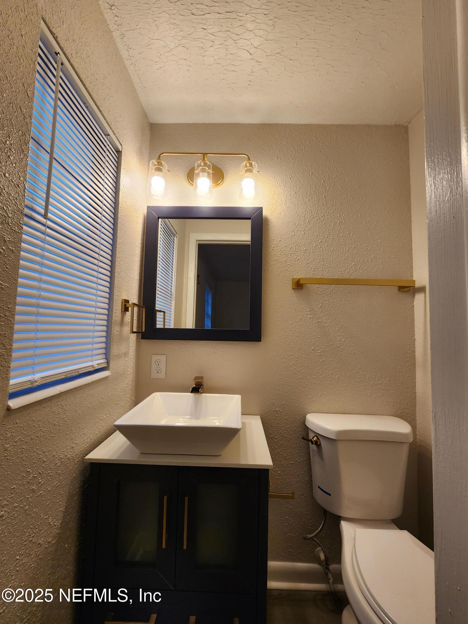 7929 Wilson Boulevard Jacksonville, FL 32210 - Photo 14 of 17 Bathroom 2 of 2