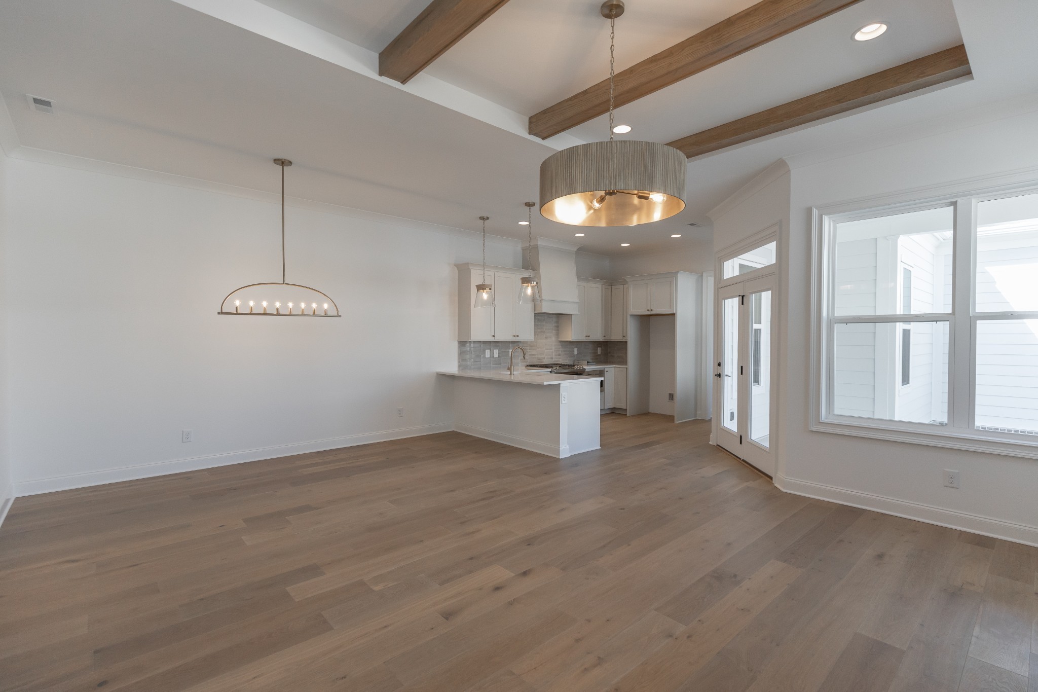 3174 Long Br Circle Franklin, TN 37064 - Photo 6 of 21 a view of a kitchen with a dishwasher cabinets and a large window