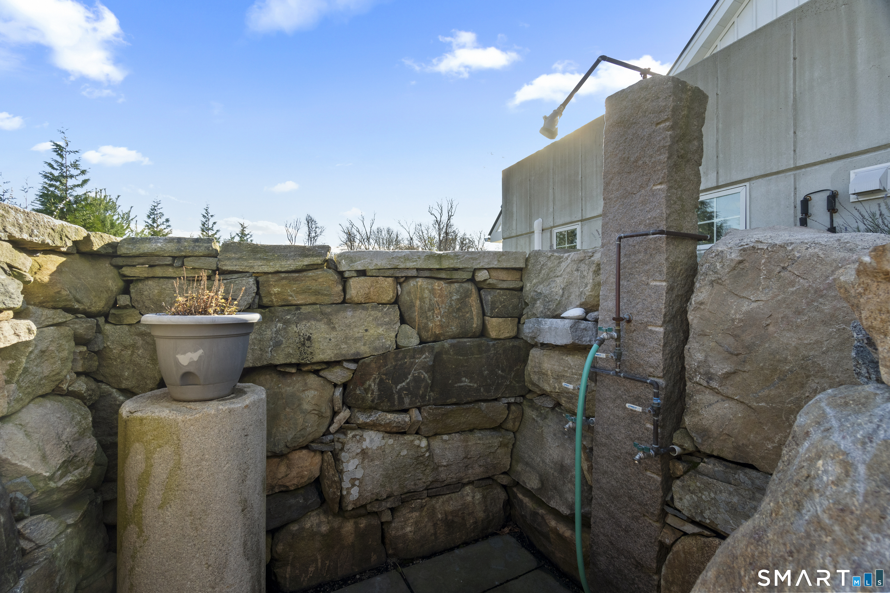 54 Barnes Road Stonington, CT 06378 - Photo 12 of 40 Private Stone Enclosure Outdoor Shower.