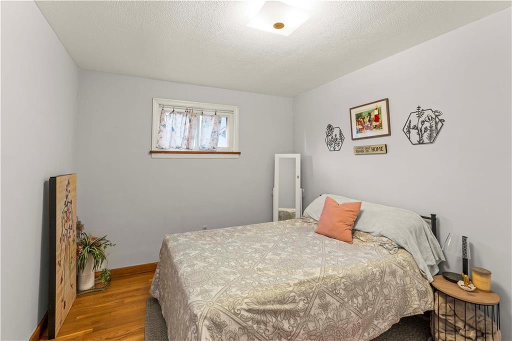 35 Lagonda Road Washington, PA 15301 - Photo 14 of 34 a bedroom with a bed and a painting on the wall