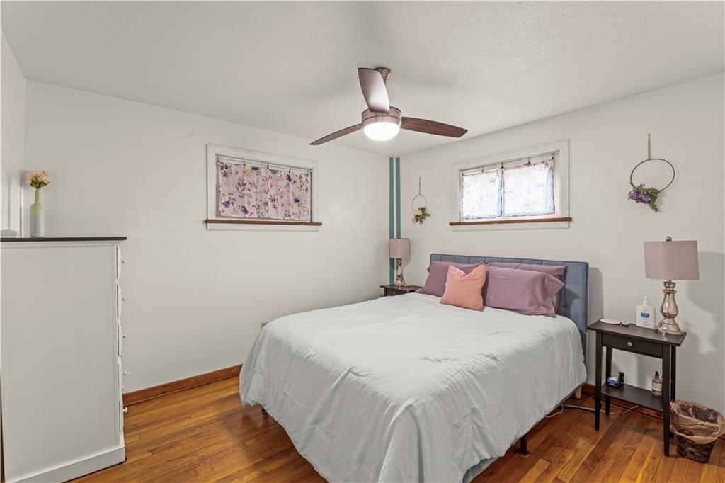 35 Lagonda Road Washington, PA 15301 - Photo 16 of 34 a bedroom with a bed and wooden floor