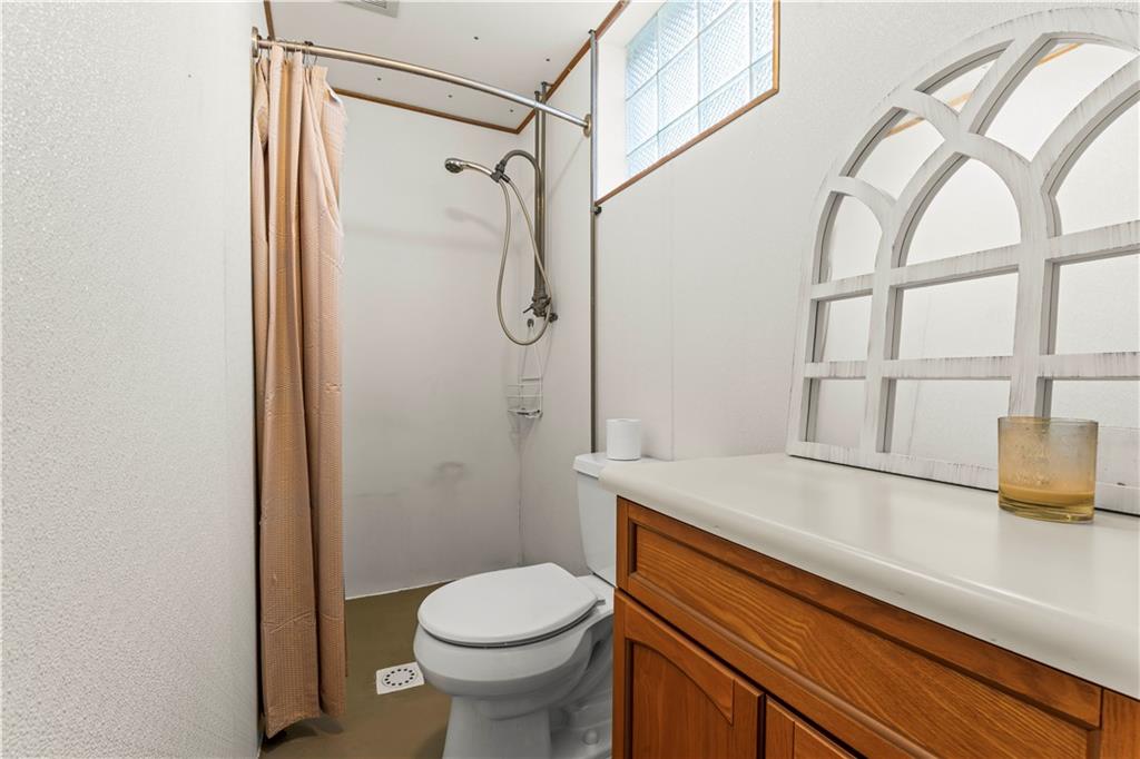 35 Lagonda Road Washington, PA 15301 - Photo 22 of 34 a bathroom with a sink a toilet and shower