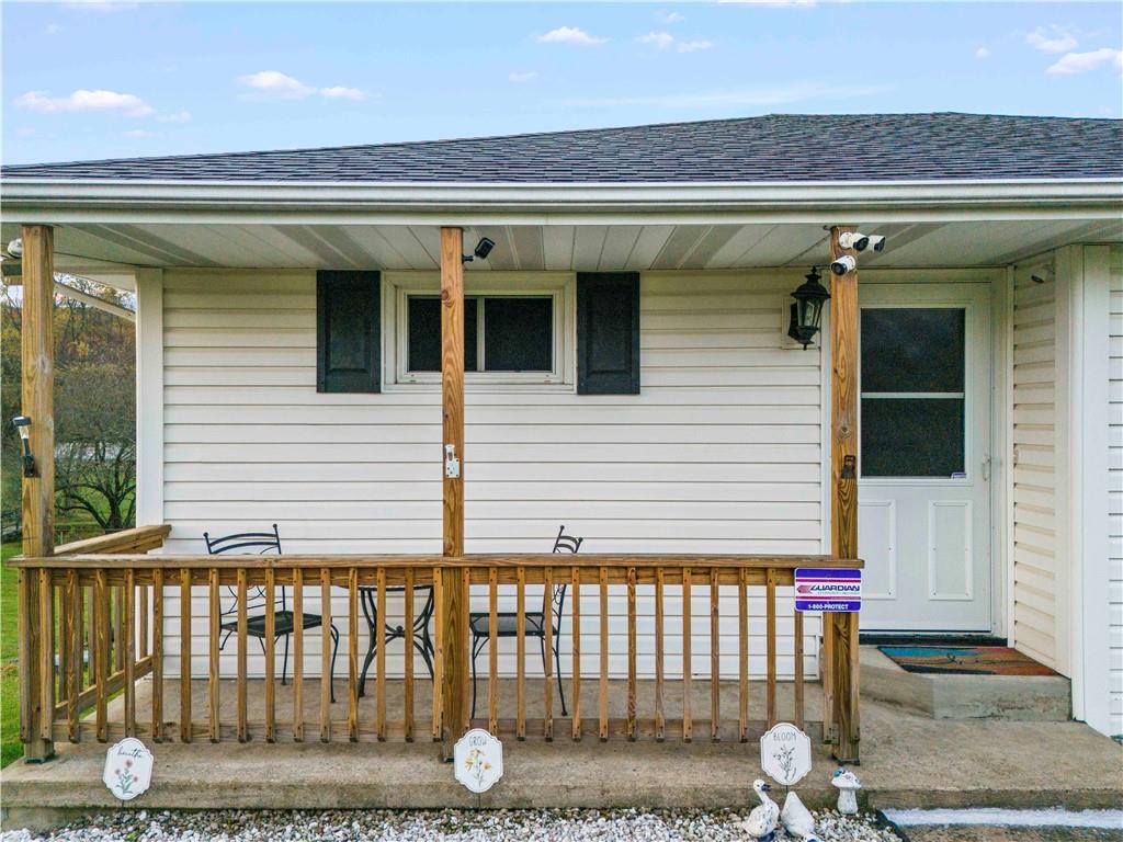 35 Lagonda Road Washington, PA 15301 - Photo 4 of 34 a view of a house with a porch and furniture