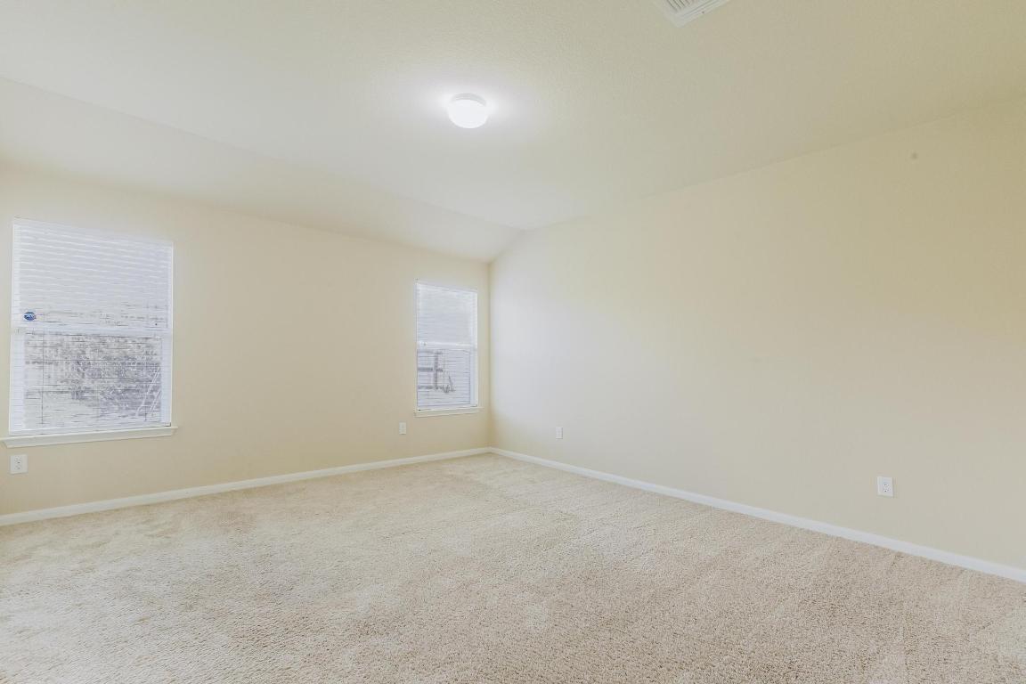 184 Voss Kyle, TX 78640 - Photo 24 of 30 an empty room with windows