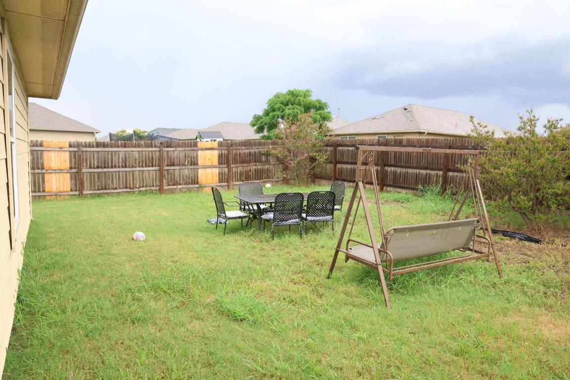 184 Voss Kyle, TX 78640 - Photo 28 of 30 a garden view with a seating space