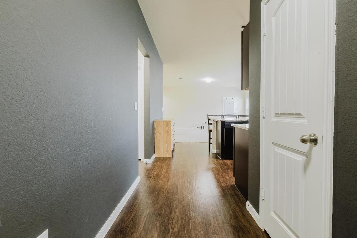 184 Voss Kyle, TX 78640 - Photo 5 of 30 a view of a kitchen from a hallway