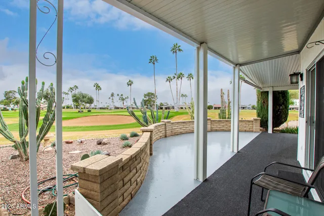 a view of swimming pool from a balcony