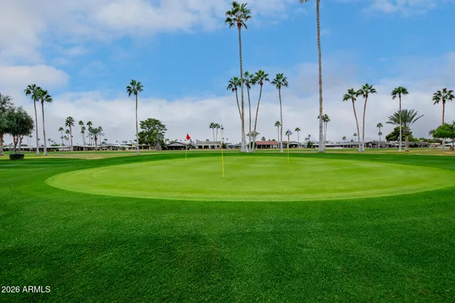a front view of a building with garden