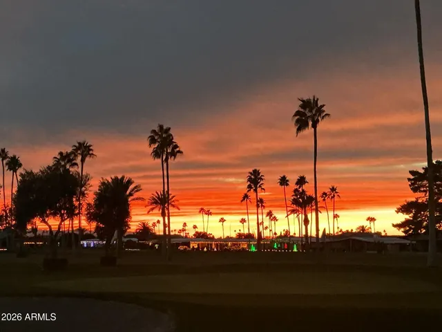 a view of a ocean with sunset
