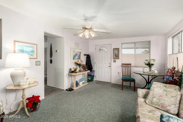 a view of a livingroom with furniture and a couch