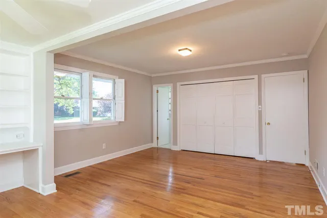 a bathroom with a sink a toilet and shower curtain