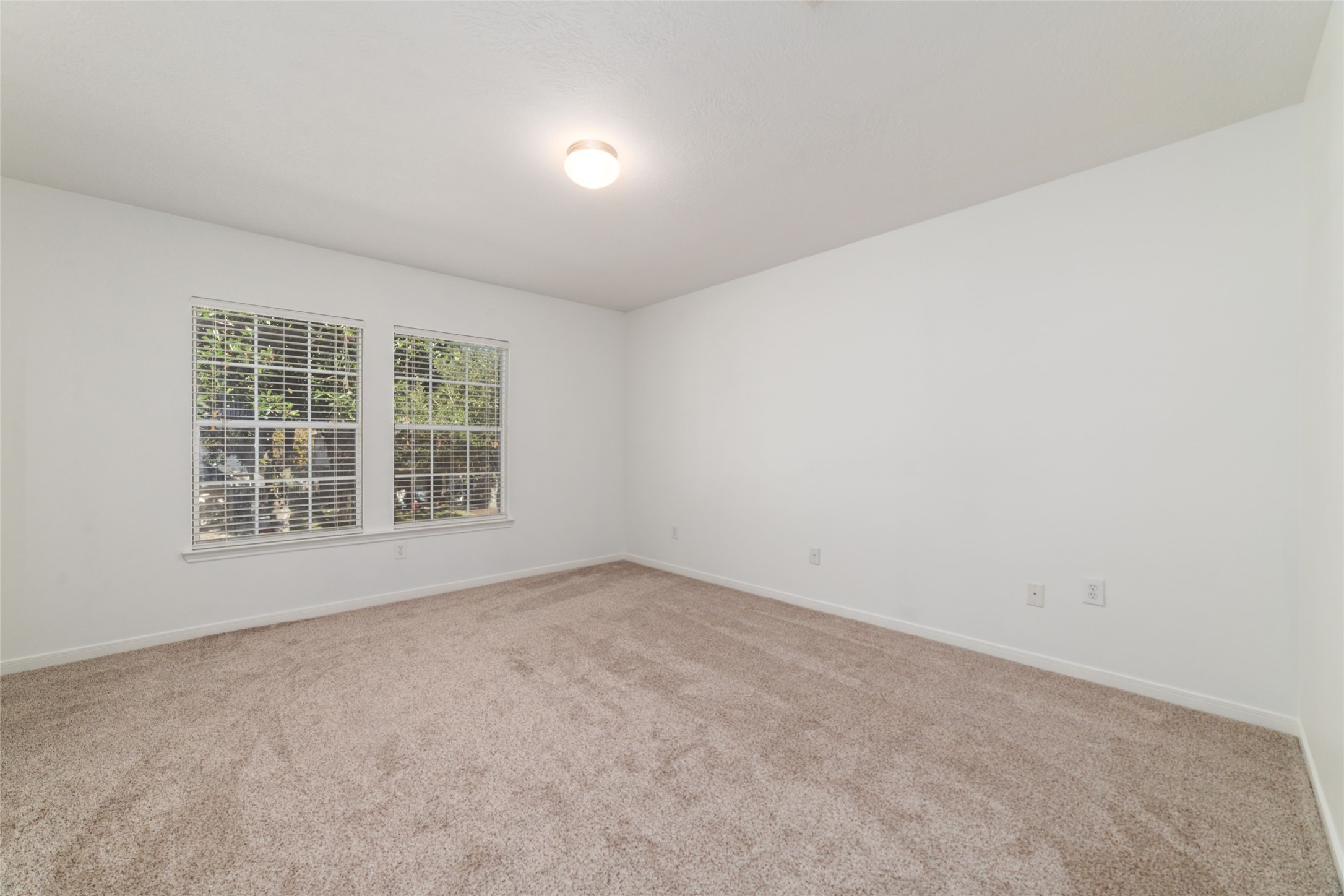 2618 Bridgestone Park Lane Spring, TX 77386 - Photo 36 of 49 The first of the five upstairs bedrooms offers an immediately noticeable sense of space.