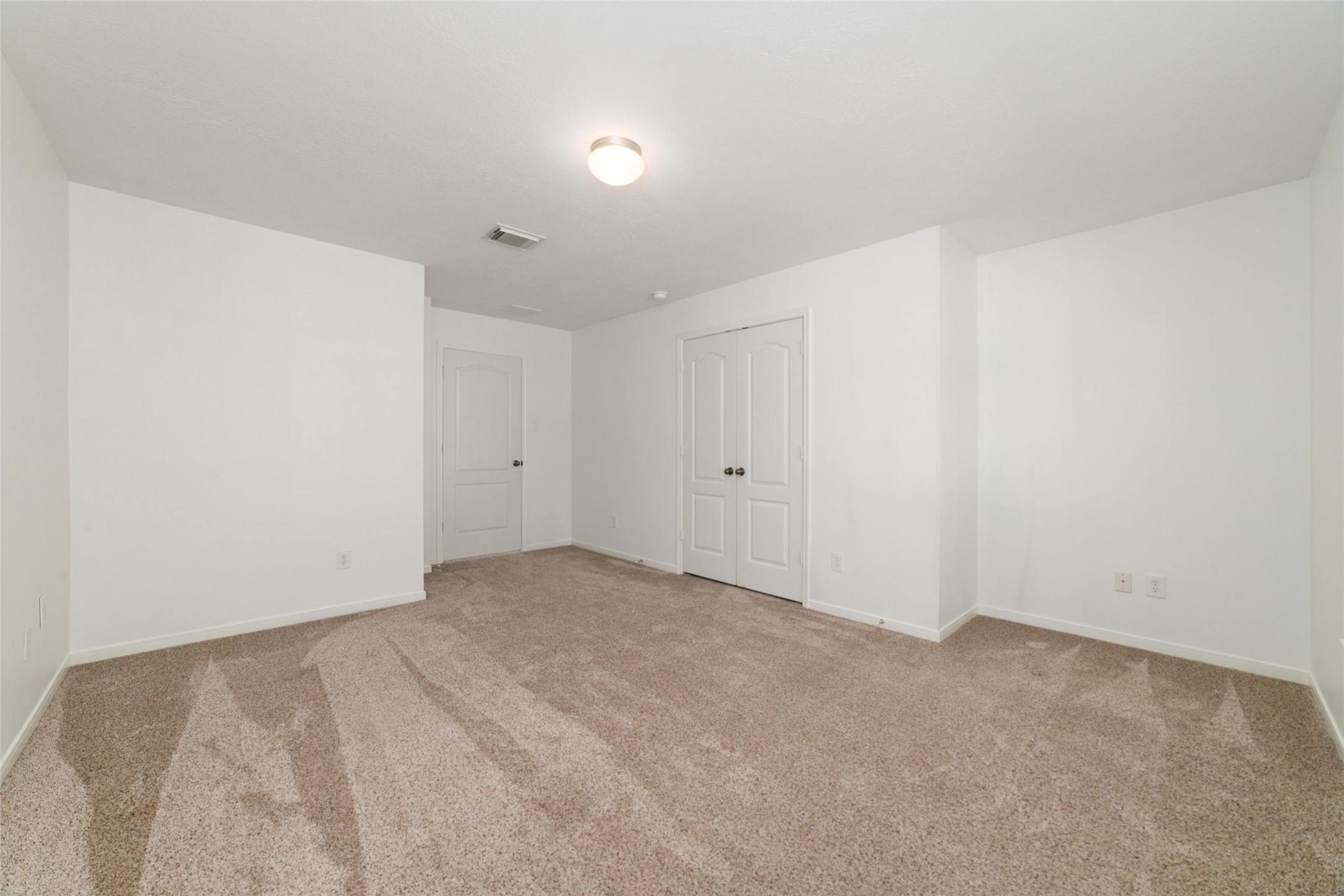 2618 Bridgestone Park Lane Spring, TX 77386 - Photo 37 of 49 Another view of the first bedroom facing towards the door and closet.