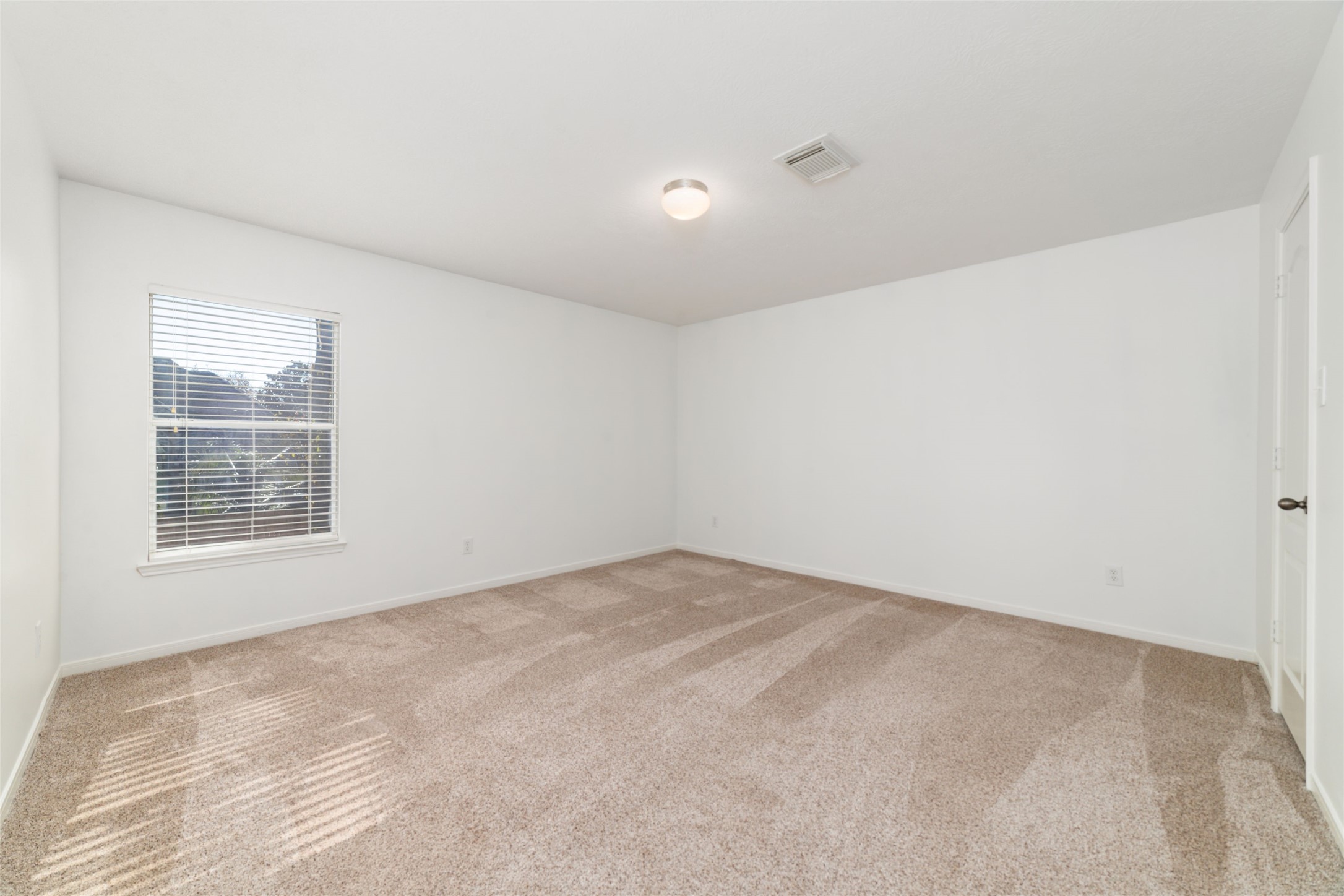 2618 Bridgestone Park Lane Spring, TX 77386 - Photo 40 of 49 The third upstairs bedroom is filled with south-facing natural light and offers a generous footprint.