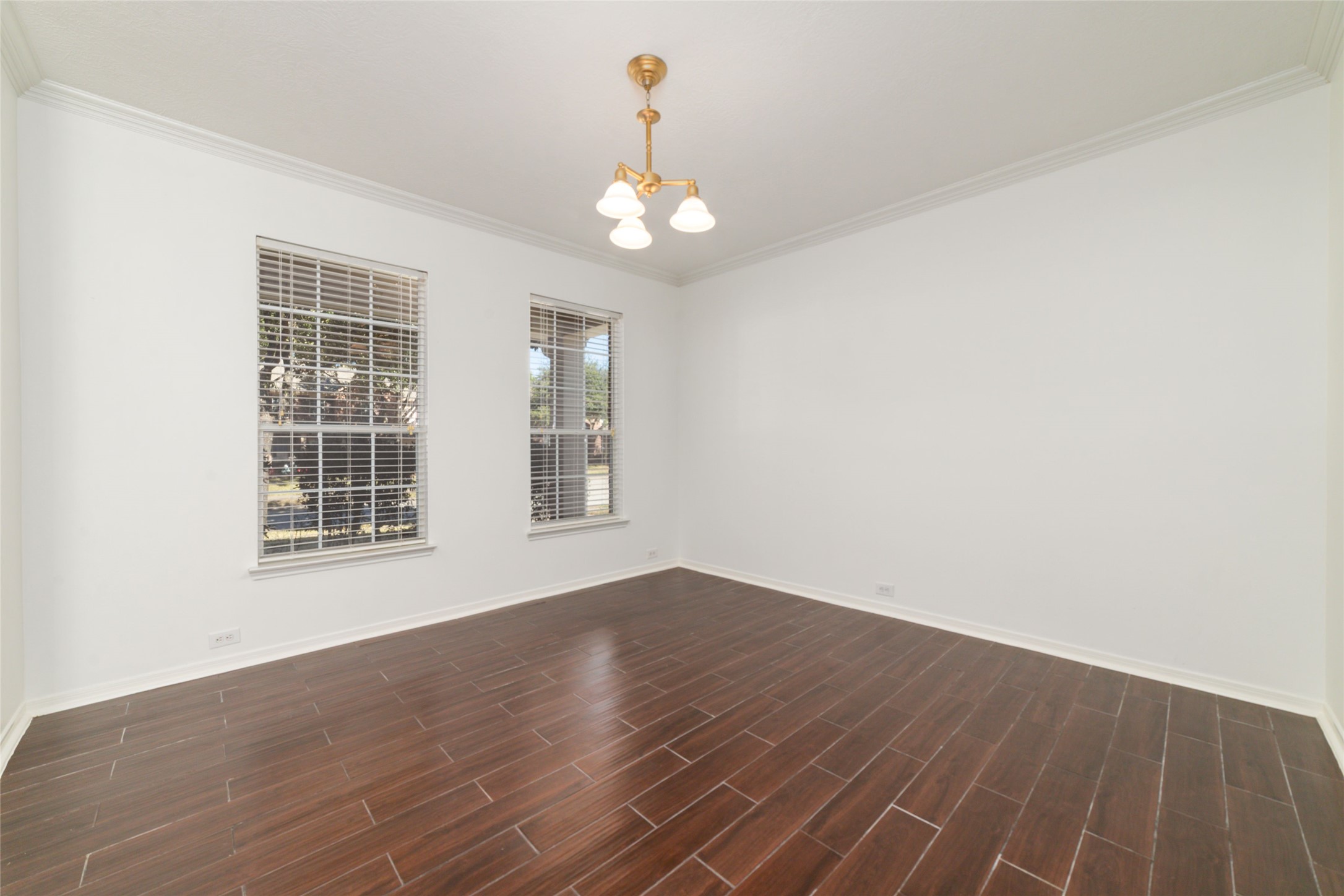 2618 Bridgestone Park Lane Spring, TX 77386 - Photo 9 of 49 In the formal dining room you will find wood-plank tile throughout that allows for easy cleaning while also enhancing the atmosphere of the space.