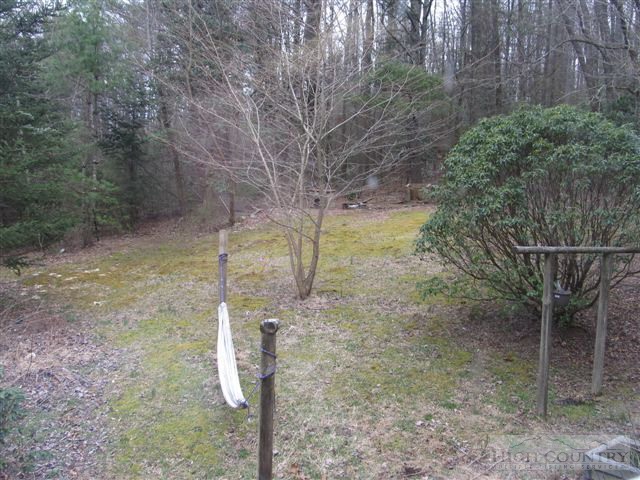 3192 Wildcat Road Deep Gap, NC 28618 - Photo 14 of 24 a backyard of a house