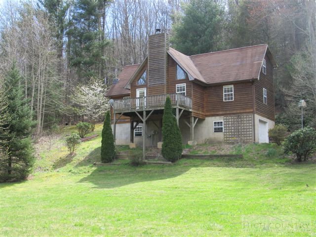 3192 Wildcat Road Deep Gap, NC 28618 - Photo 2 of 24 a front view of a house with a yard