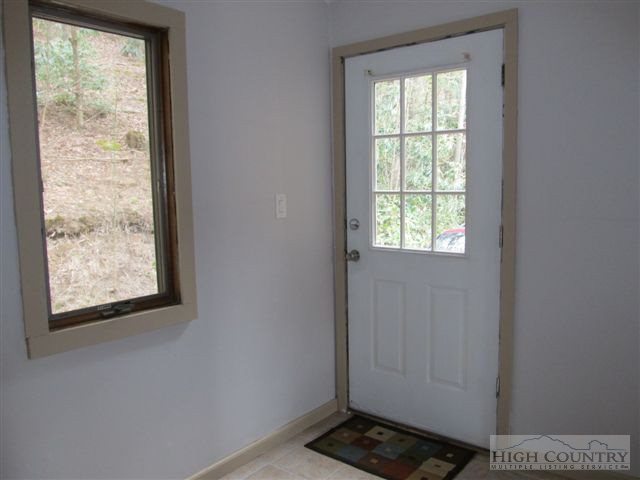 3192 Wildcat Road Deep Gap, NC 28618 - Photo 8 of 24 a view of a room that has a window in it