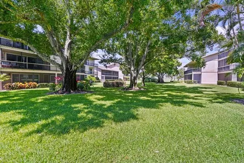 a view of a house with a big yard