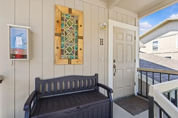 a view of entryway with wooden floor