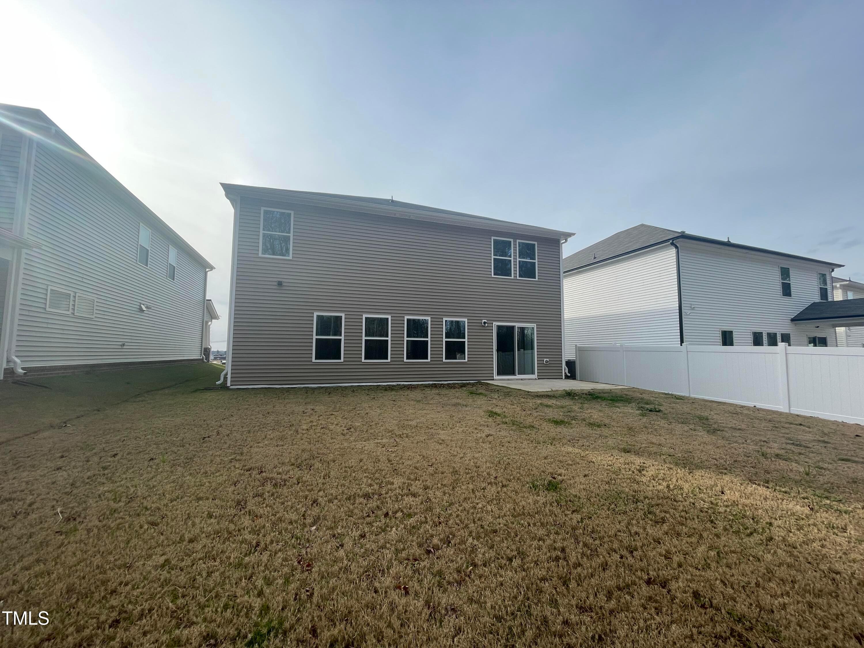 119 Red Valor Street Garner, NC 27529 - Photo 27 of 27 a view of a house with a backyard