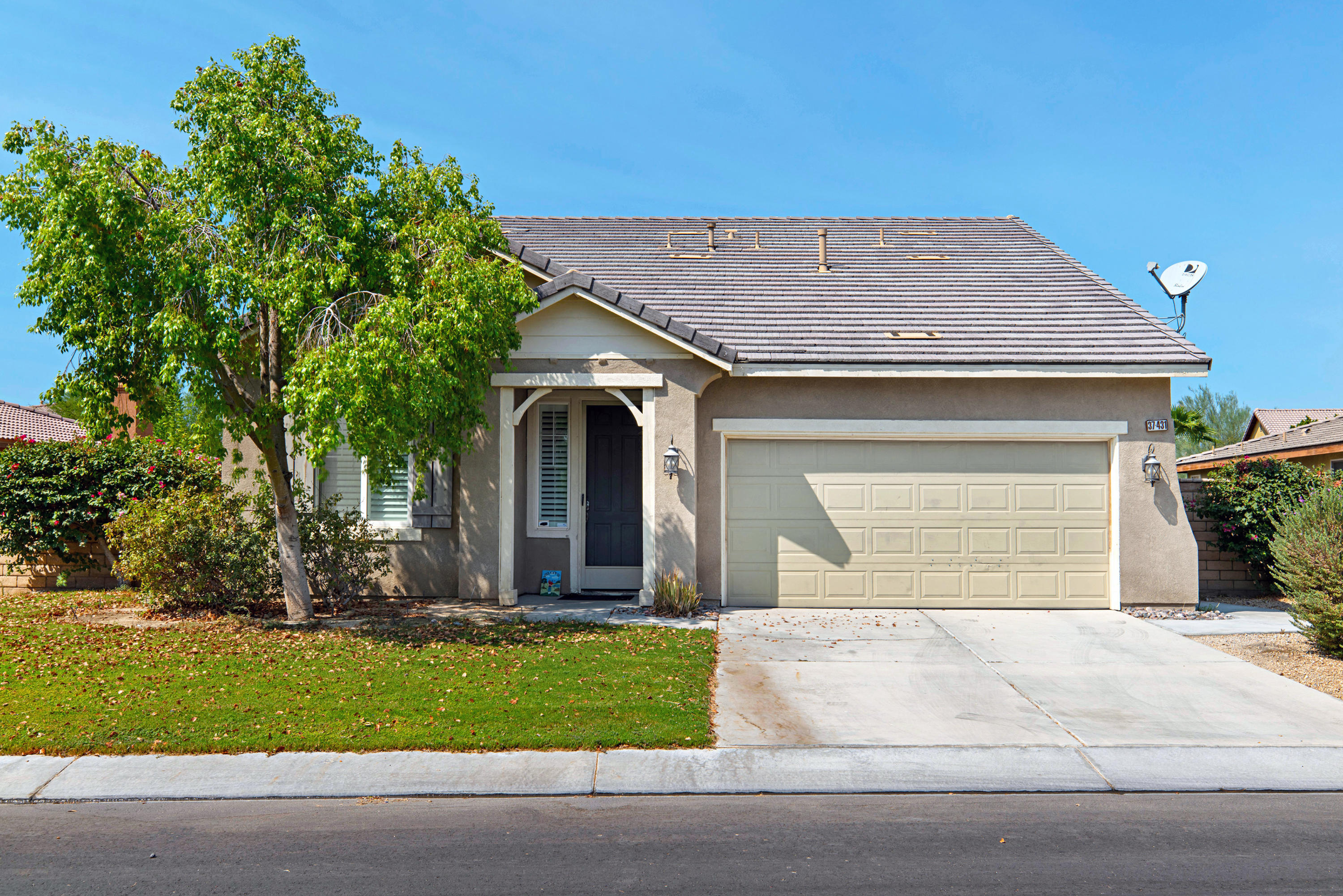 37431 Haweswater Road Indio, CA 92203 - Photo 40 of 41 front view of a house with a yard