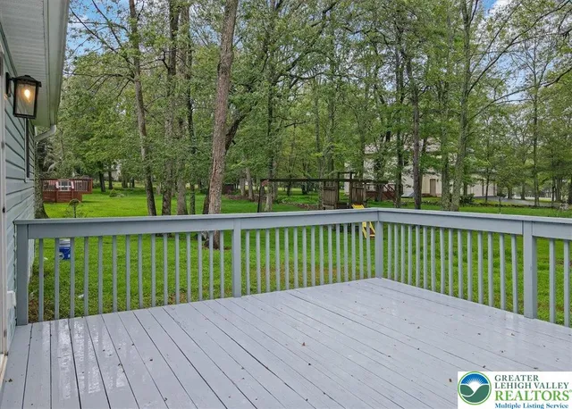 a view of a wooden roof deck
