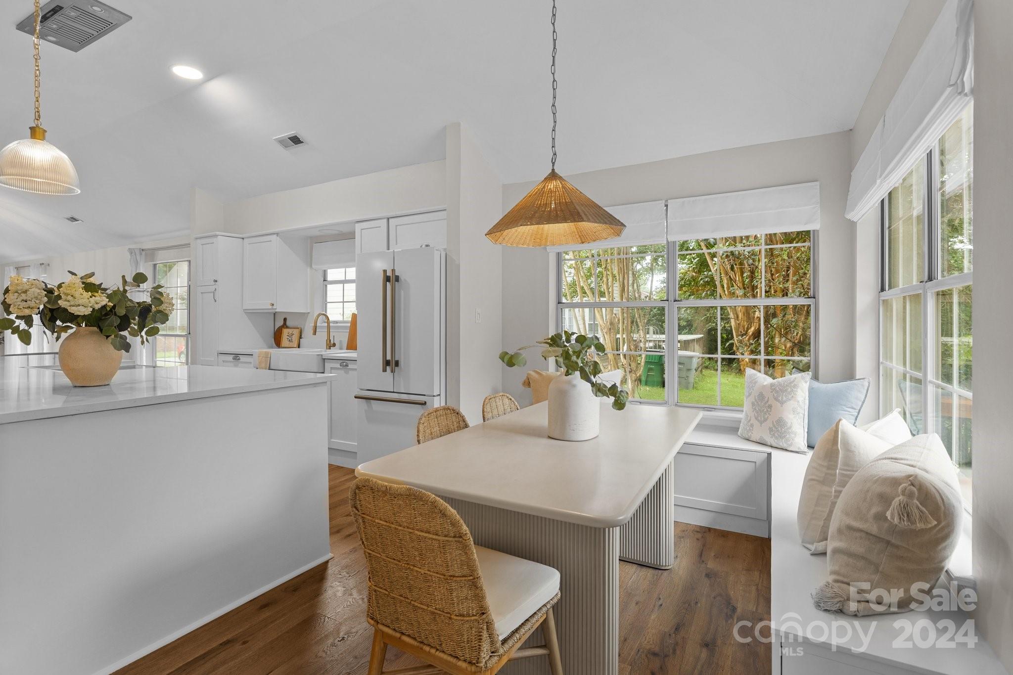 10527 Fairway Ridge Road Charlotte, NC 28277 - Photo 16 of 45 a dining room with furniture window and wooden floor