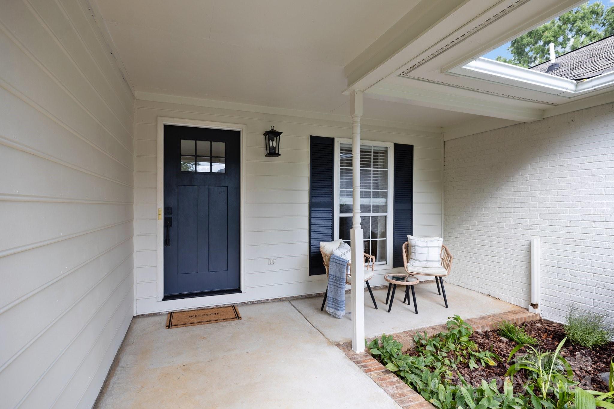 10527 Fairway Ridge Road Charlotte, NC 28277 - Photo 2 of 45 a house view with outdoor space and sitting space