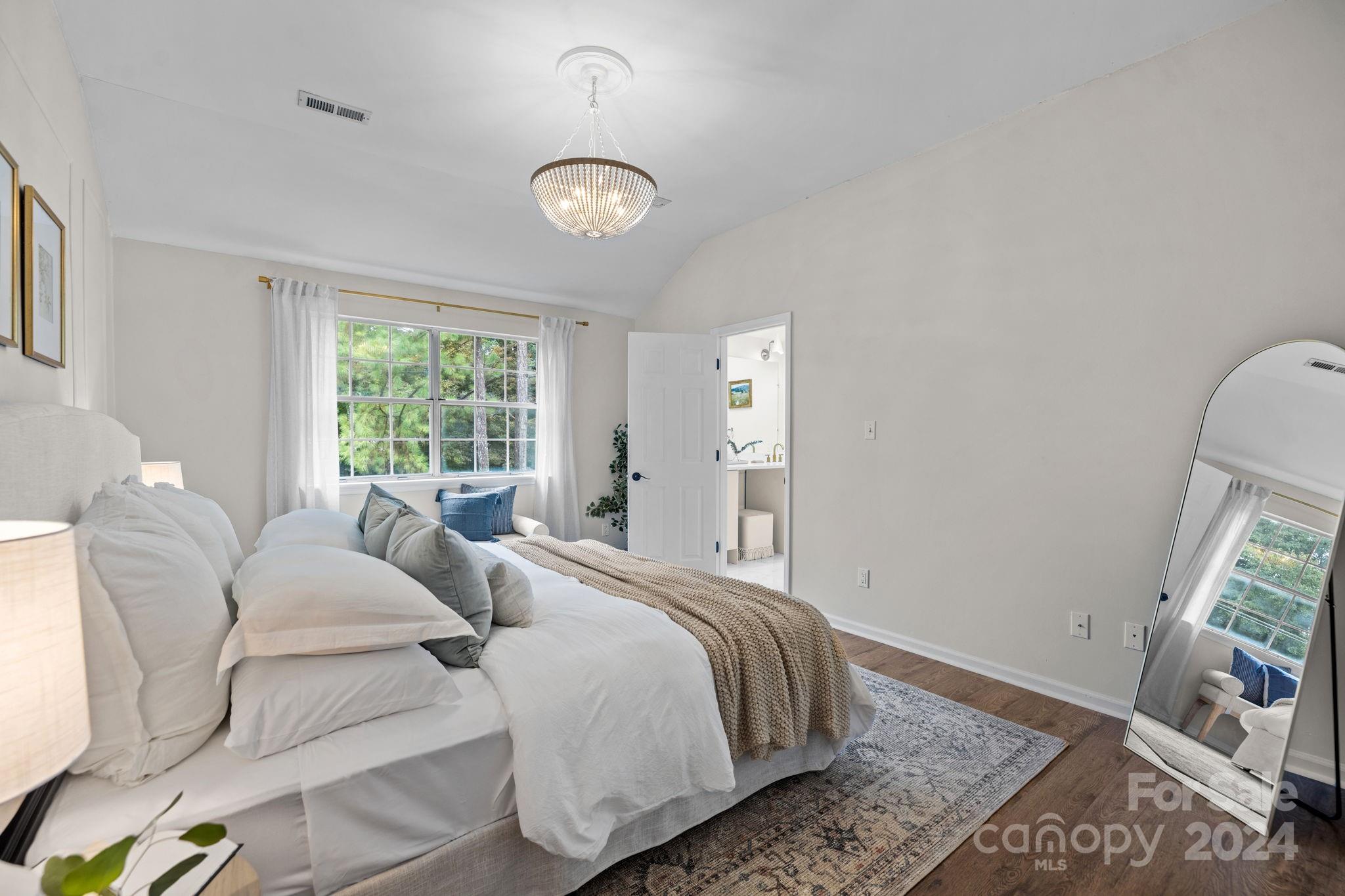 10527 Fairway Ridge Road Charlotte, NC 28277 - Photo 25 of 45 a bedroom with a bed and a window